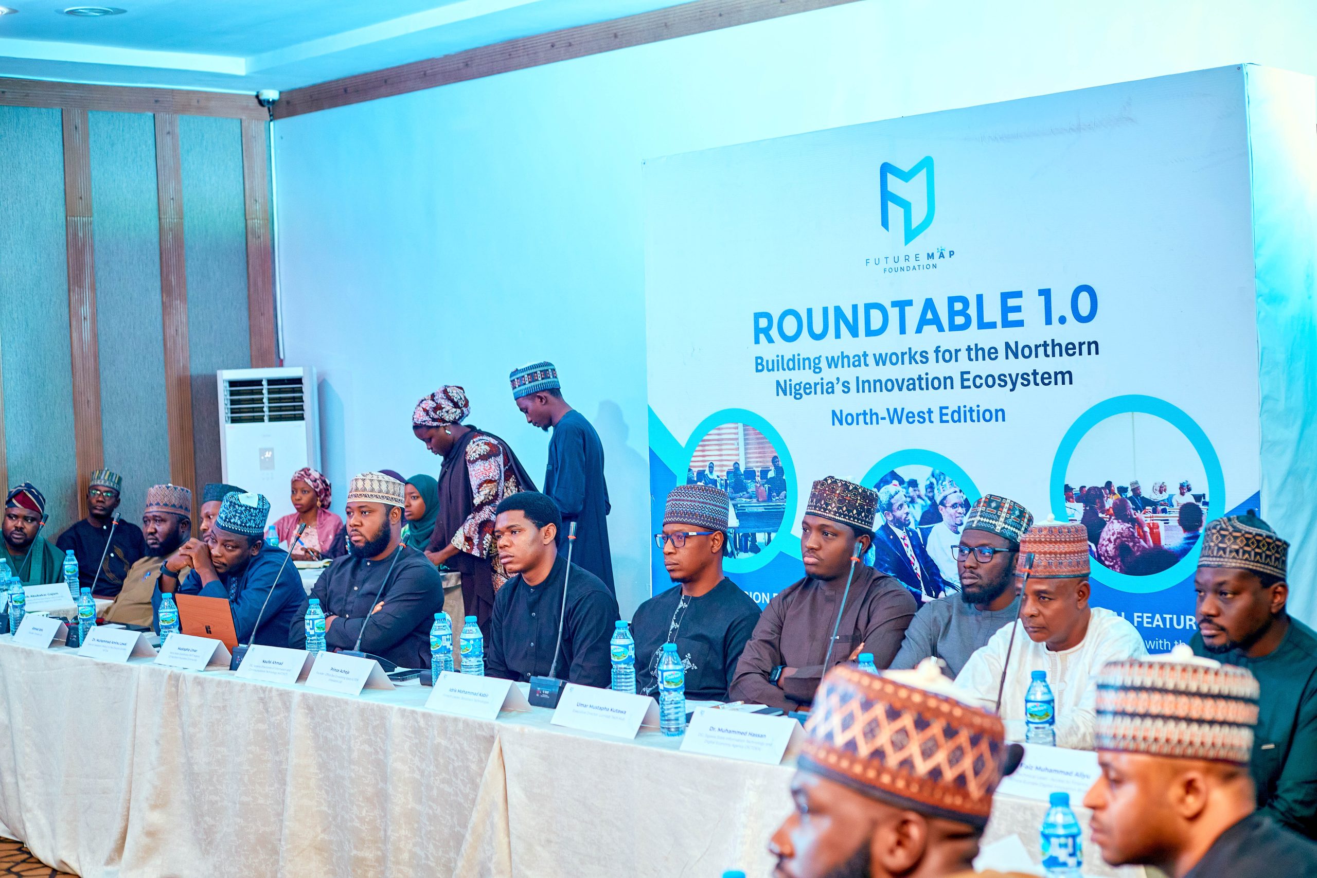 Participants seated around tables at FutureMap Roundtable 1.0 in Kano