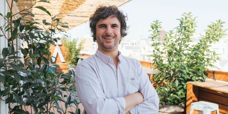 Gabriel Espín standing on a planted terrace at Aticco