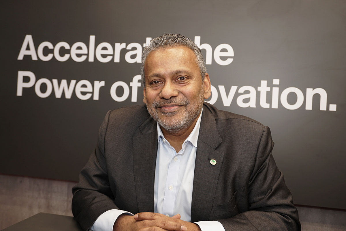 Gajen Kandiah seated for an interview during his time as president and COO of Hitachi Digital
