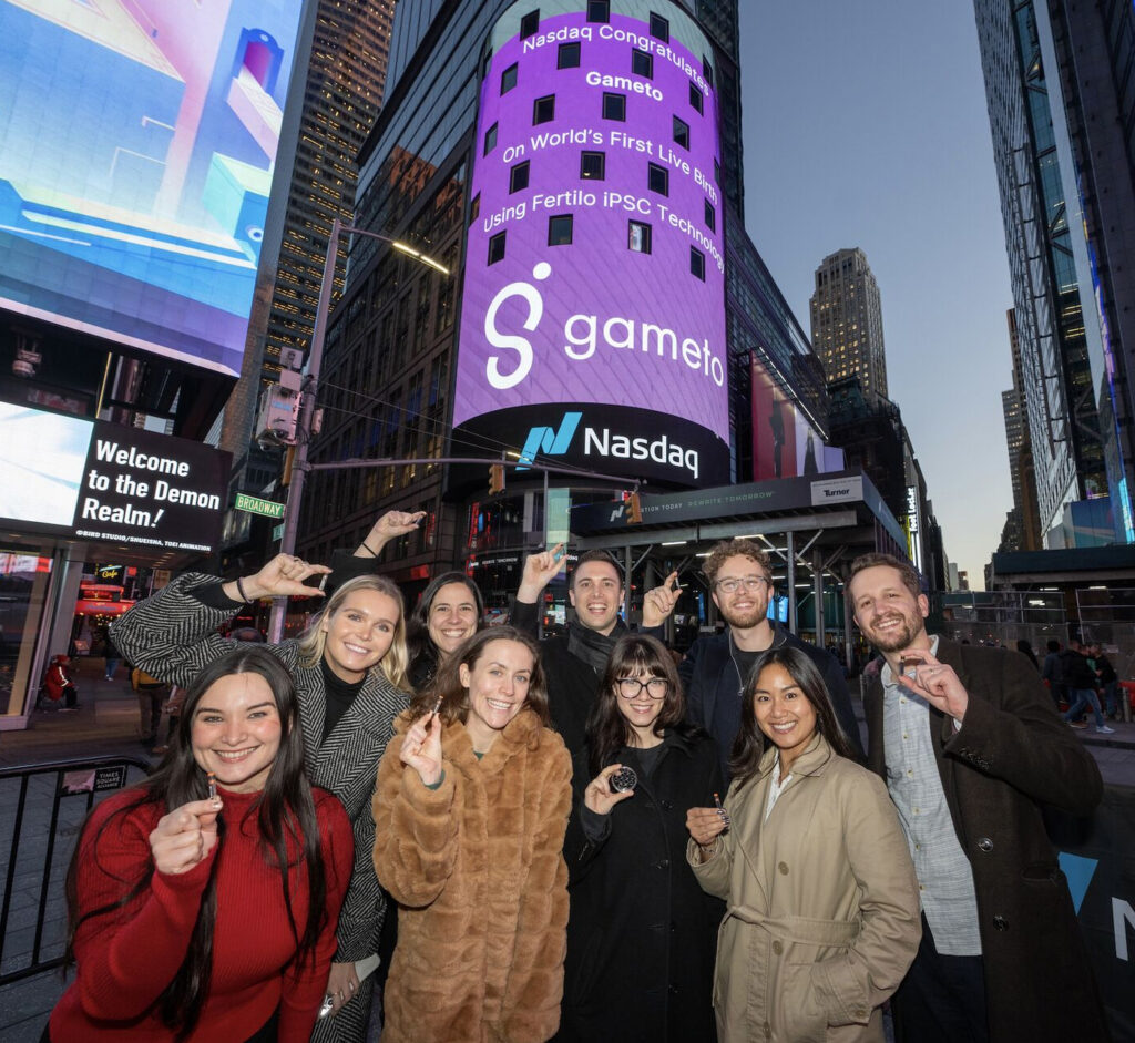 Gameto team celebrating beneath a Nasdaq screen recognizing the first Fertilo live birth