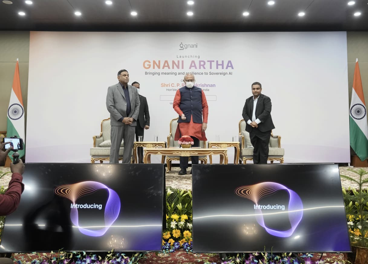 Ganesh Gopalan, standing left, at the Gnani Artha launch with Vice-President C. P. Radhakrishnan and Ananth Nagaraj in New Delhi.