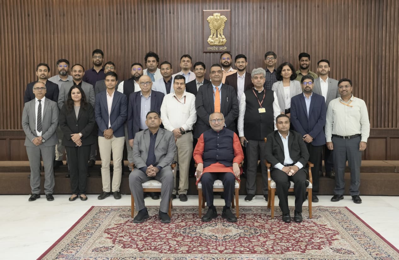 Ganesh Gopalan seated at left in a group photograph with the Vice-President and attendees at the Gnani Artha launch.