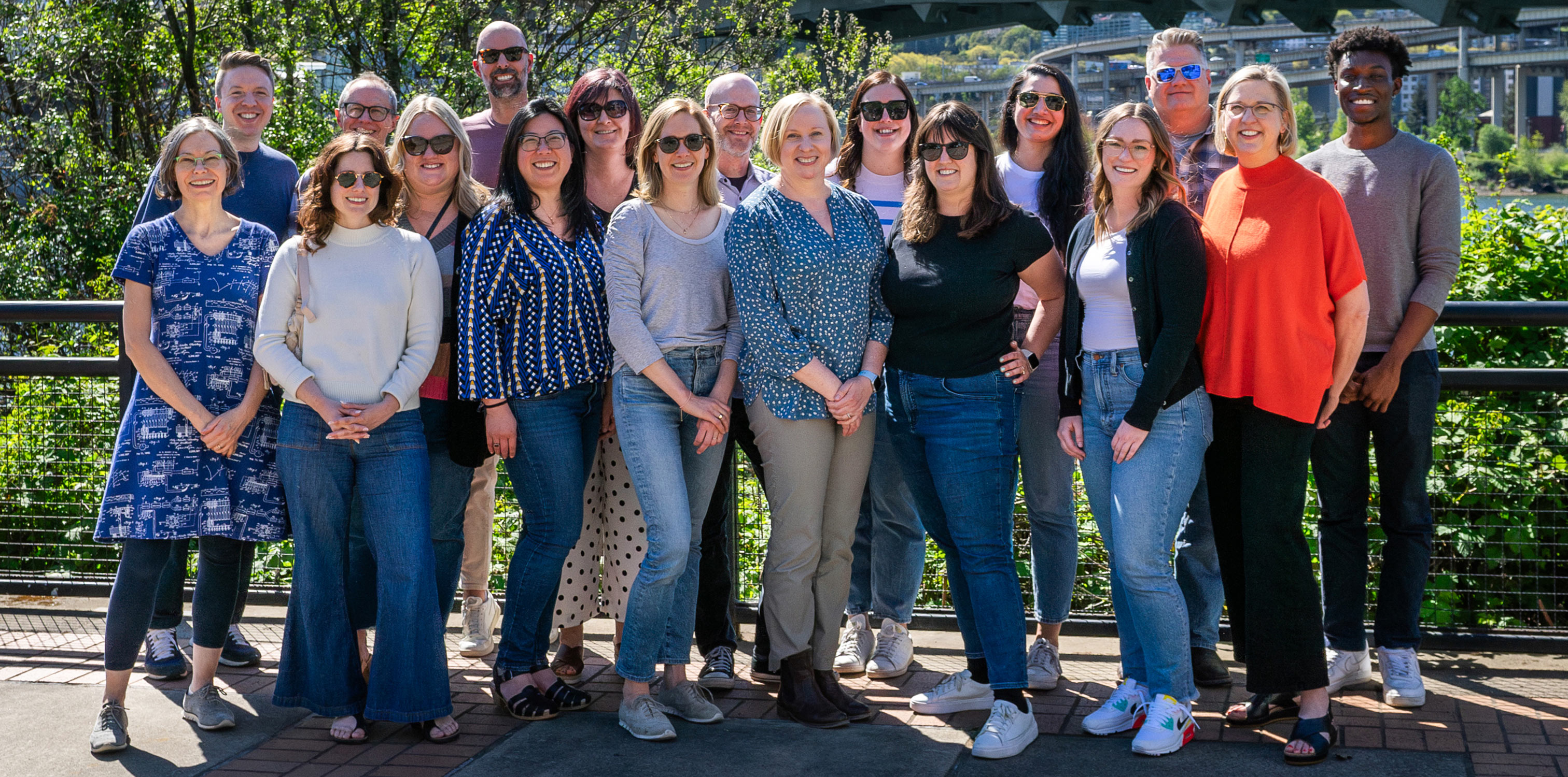 Gard Communications team jumping together during a Portland waterfront retreat