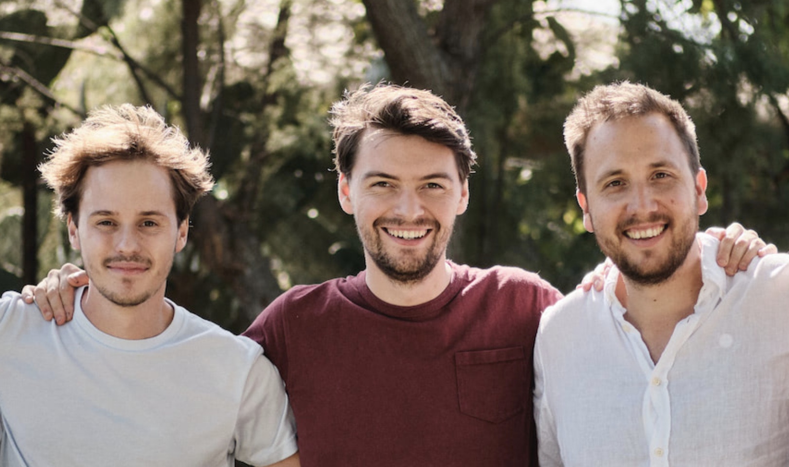 Marker.io co-founders Olivier Kaisin, Emile-Victor Portenart and Gary Gaspar standing together outdoors