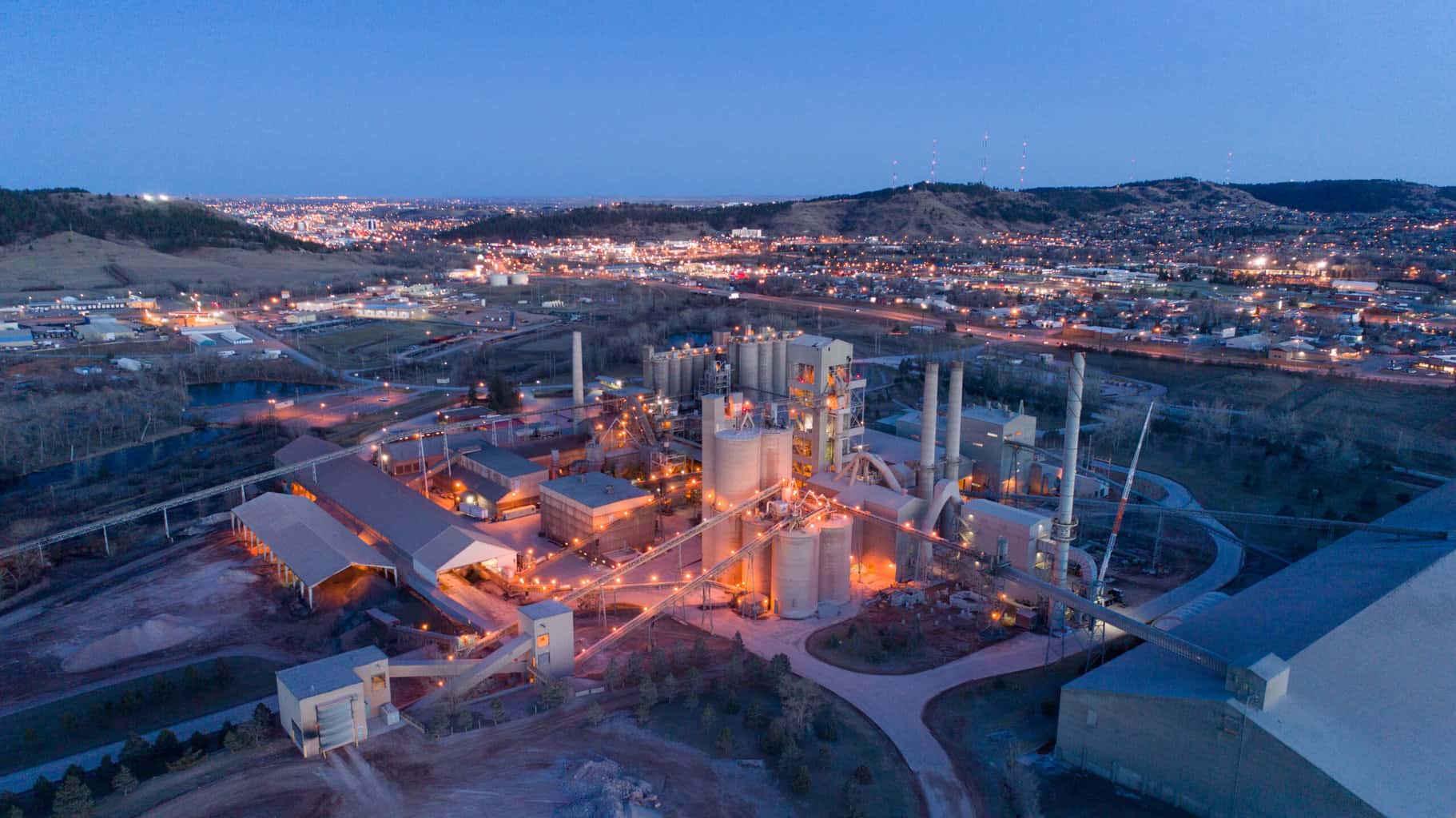 GCC’s Rapid City cement plant illuminated at dusk