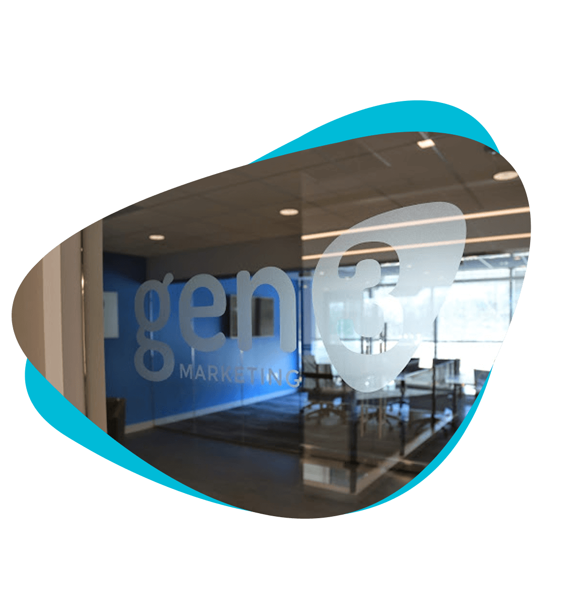Glass wall bearing the Gen3 Marketing name at the company's office