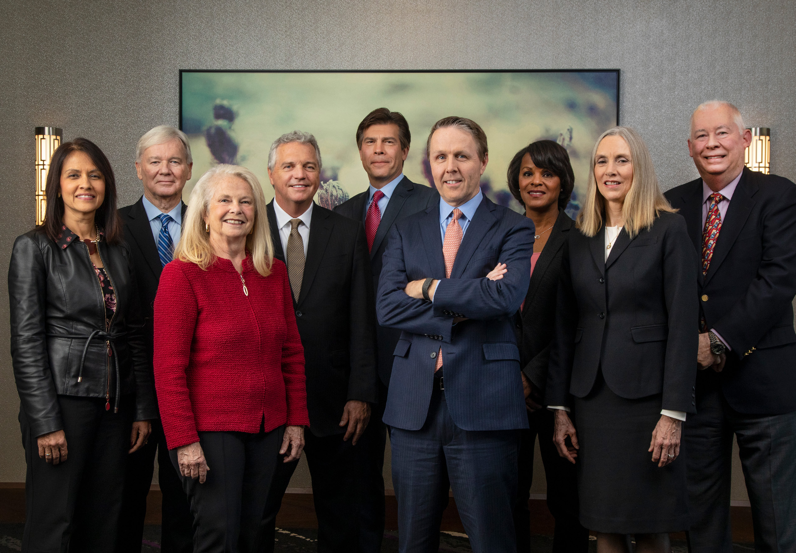 Gene Lowe, standing front center with arms crossed, alongside SPX board colleagues