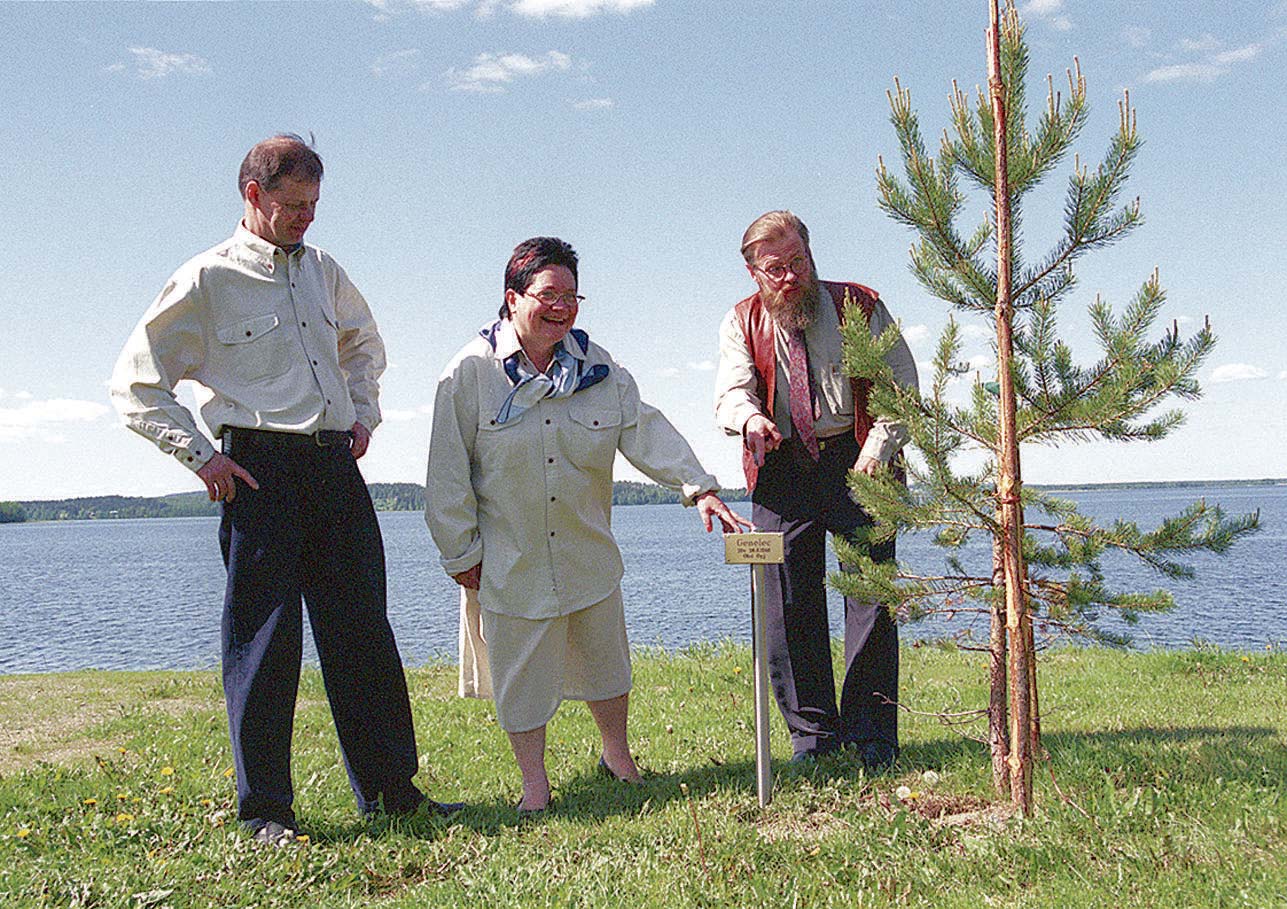 Genelec founders and early team members in an archival company photograph