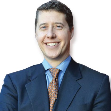 Geoff Nudd in a suit and patterned tie, in a photograph used on his ClearCare professional profile