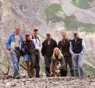 Seven people on a rocky San Juan Mountains site visit; Geoffrey Hoyl stands at the far right.