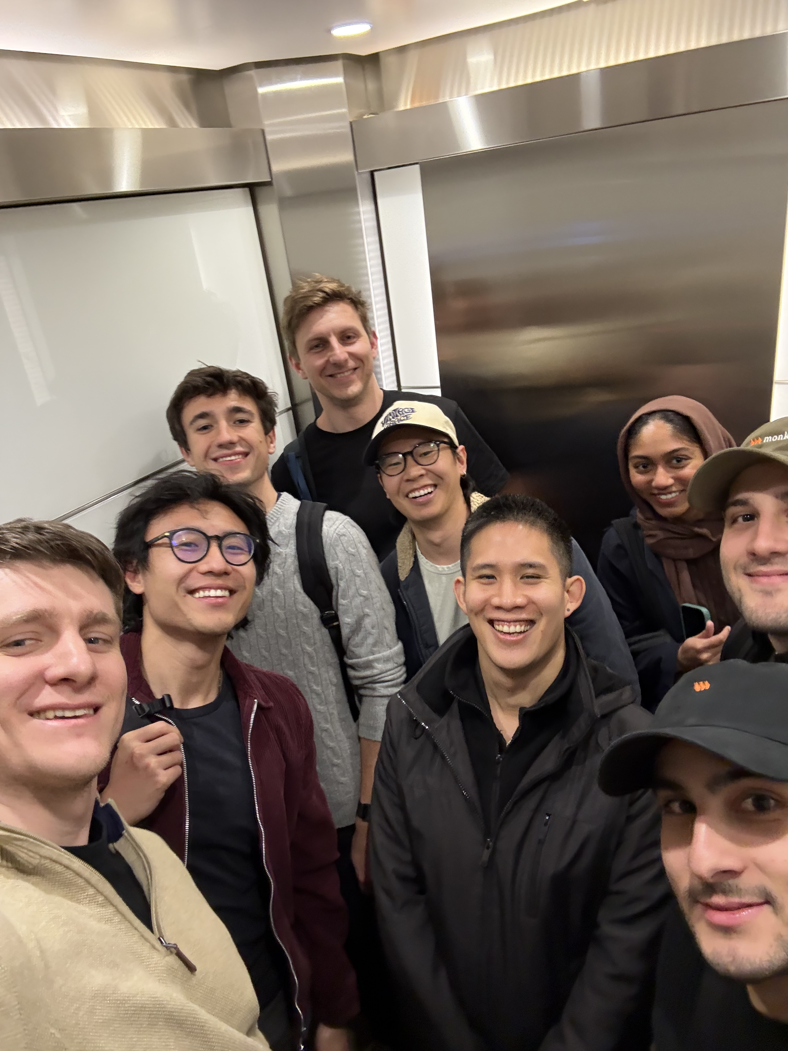 George Kurdin with members of the Monk team in a group selfie