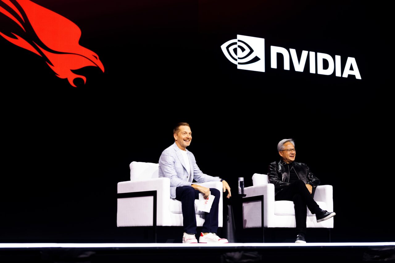 George Kurtz, left, and Jensen Huang seated on stage at Fal.Con 2026
