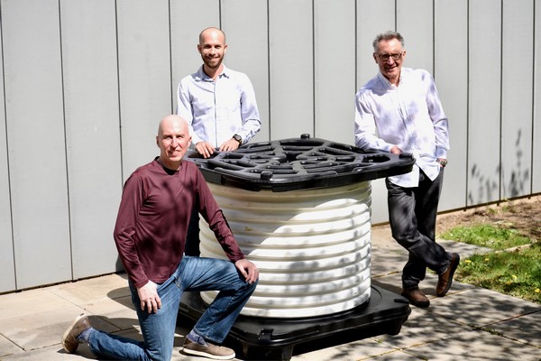RipeLocker team members Eric Levi, Andy Harrah and George Lobisser standing with a RipeLocker chamber