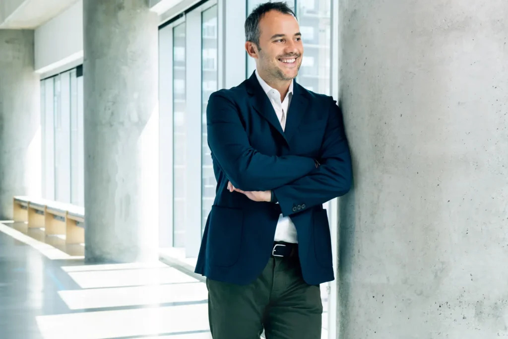 George Popstefanov seated in a Dallas office setting