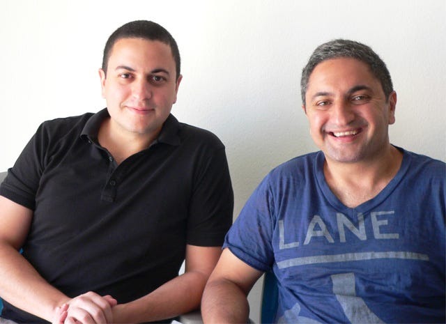 Brothers Ralph Harik, left, and Georges Harik, right, seated together