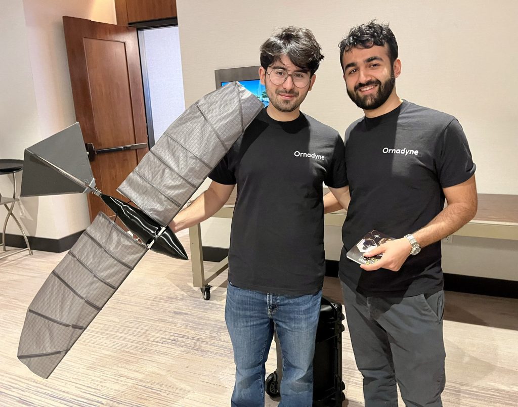Ornadyne co-founders Armen Arakelyan and Geourg Kivijian standing with the flapping-wing O1 prototype