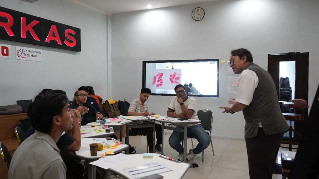 Participants seated around workshop tables during Hatch x PEDE Bali onboarding