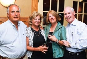 Gerald F. Mahoney, far right, with JoAnne Mahoney and Frank and Marie Braccia at Adelphi’s 2007 Golf Classic