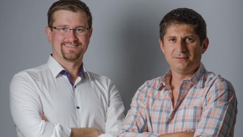 Gerard Szatvanyi on the left and Alin Dorobantu on the right, standing together