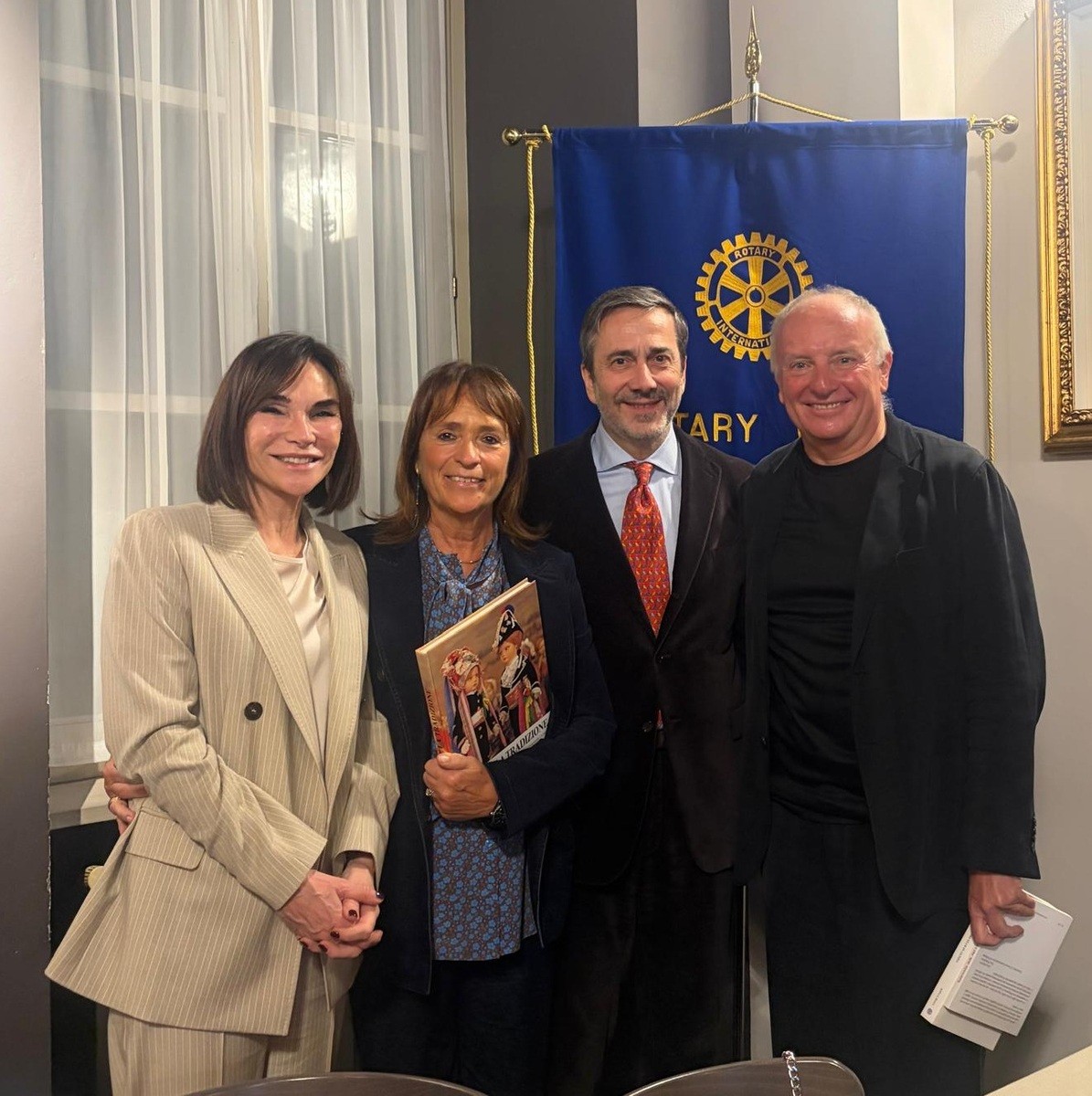 Giampiero Rinaudo, at right, with fellow attendees at a Rotary Club Cuneo gathering