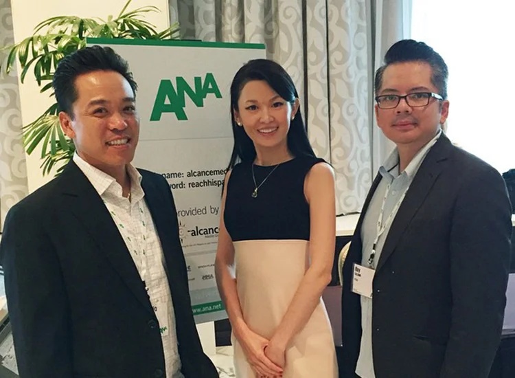 Giancarlo Pacheco, left, with account manager Saina and marketing vice president Rey Lozano at an ANA conference in 2014