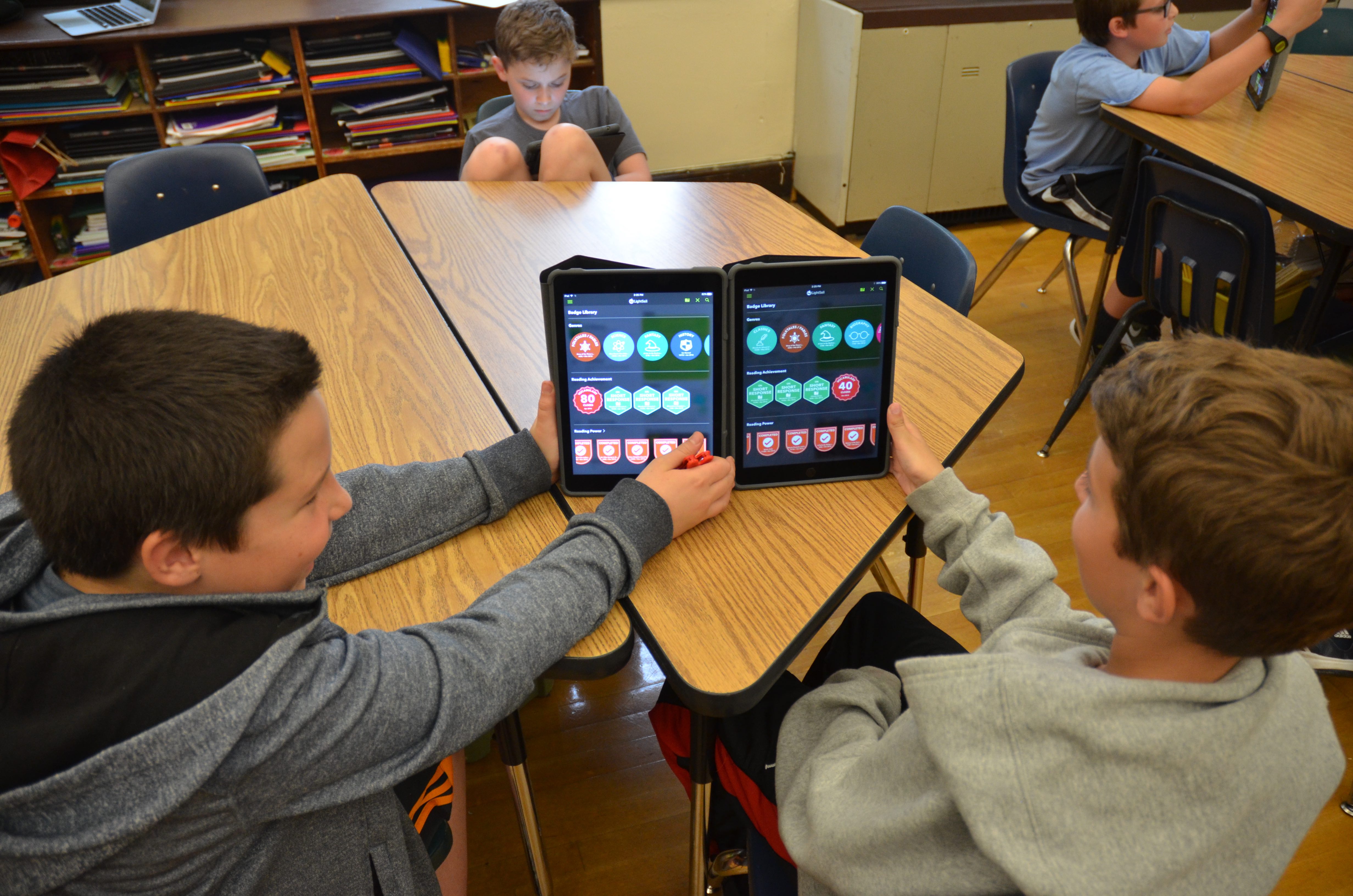Students in a Nassau County, New York classroom working with tablets and LightSail