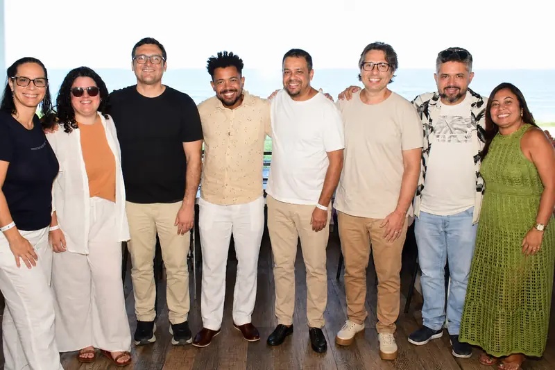 Eight members of the GIGA IT team standing together for a group photograph