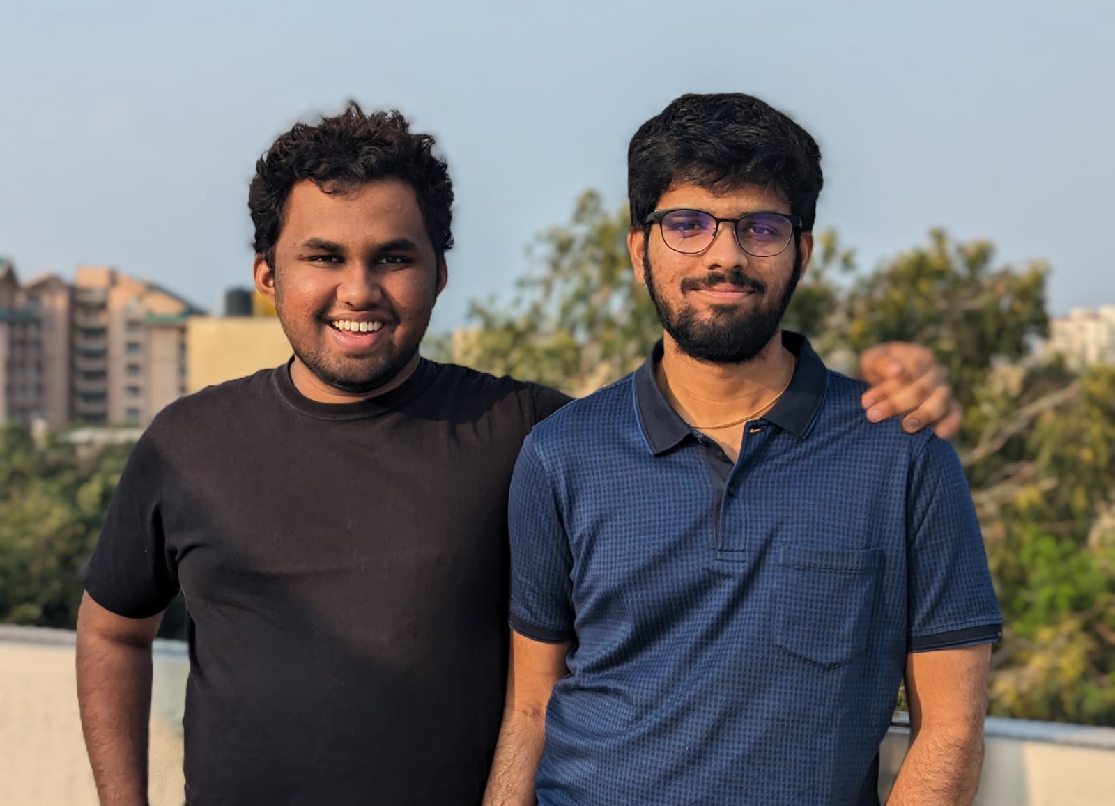 Giga co-founders Varun Vummadi and Esha Manideep Dinne together outdoors