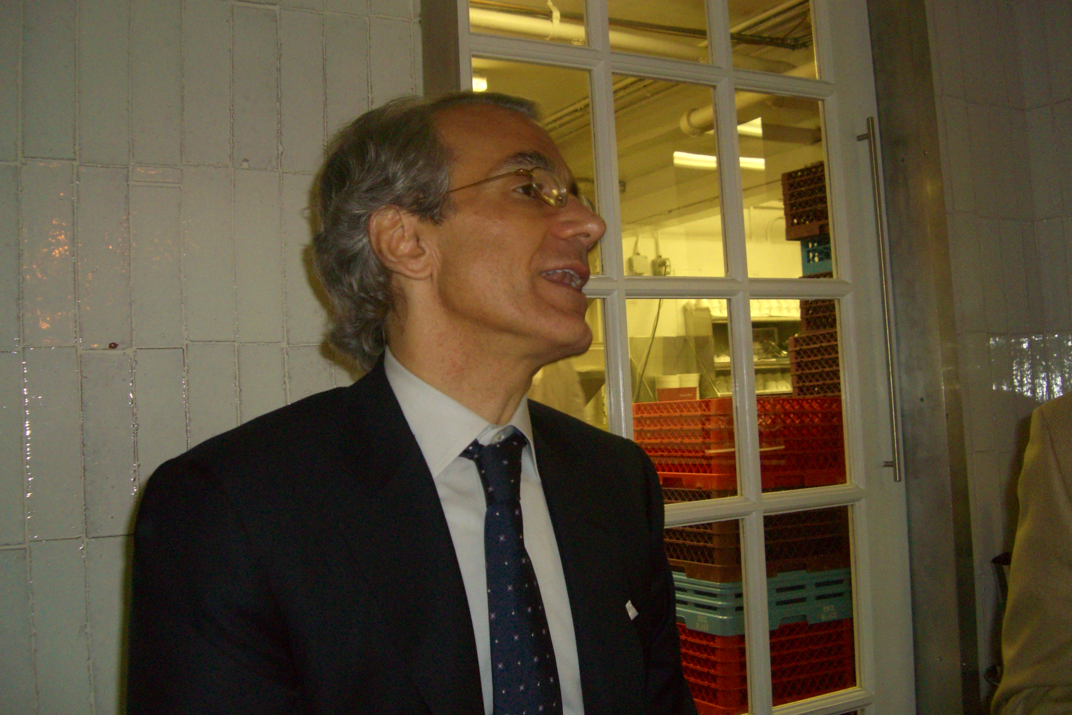Giovanni Colella in conversation beside a window in February 2008
