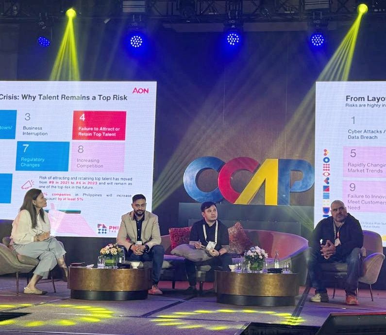 Giriish Bindal seated with fellow panelists on the Contact Islands stage in Cebu