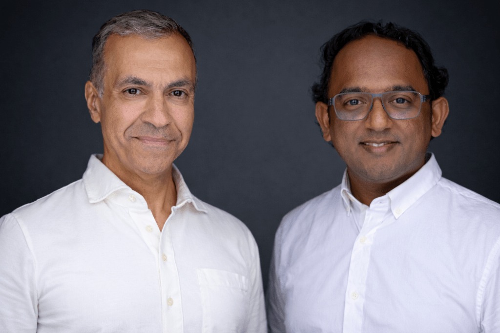 Gitar co-founders Ali-Reza Adl-Tabatabai and Gautam Korlam in white shirts against a dark background