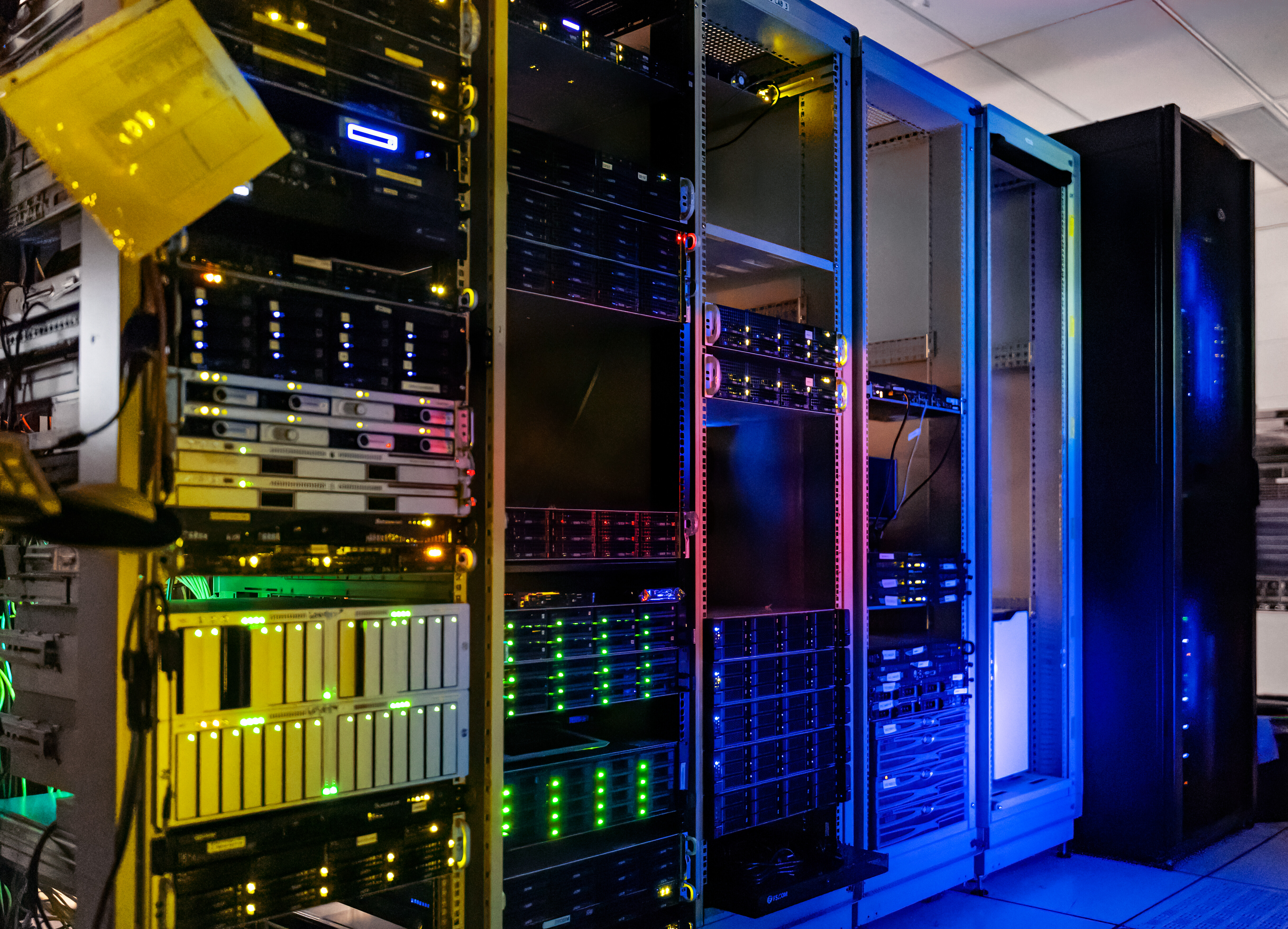Rows of computer server racks in a data center