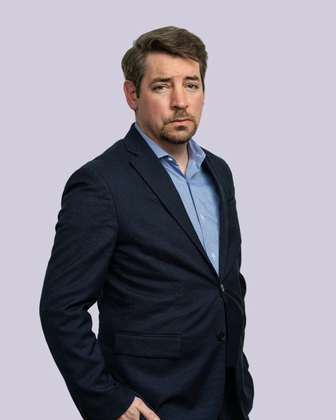 Global Situation Room founder Brett Bruen in a navy jacket
