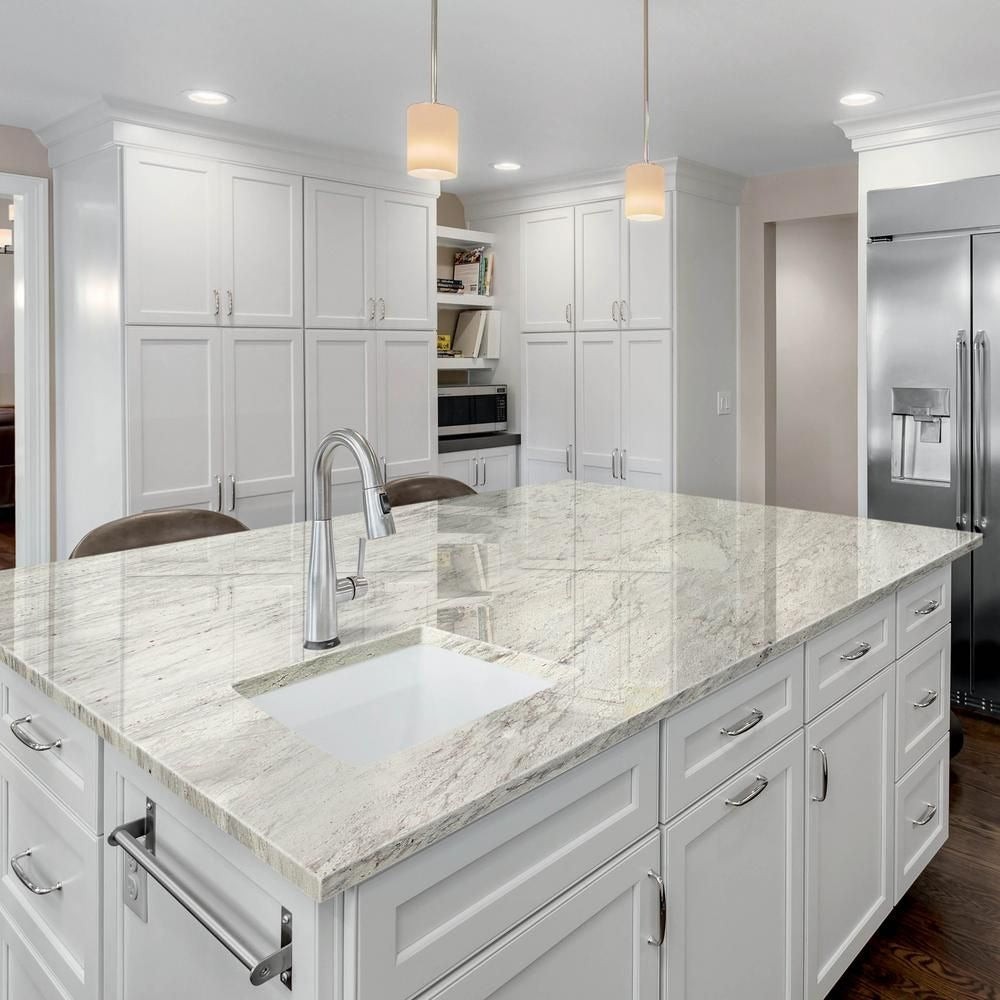 Kitchen with a stone countertop and white cabinets, shown in GlobalFair's product imagery