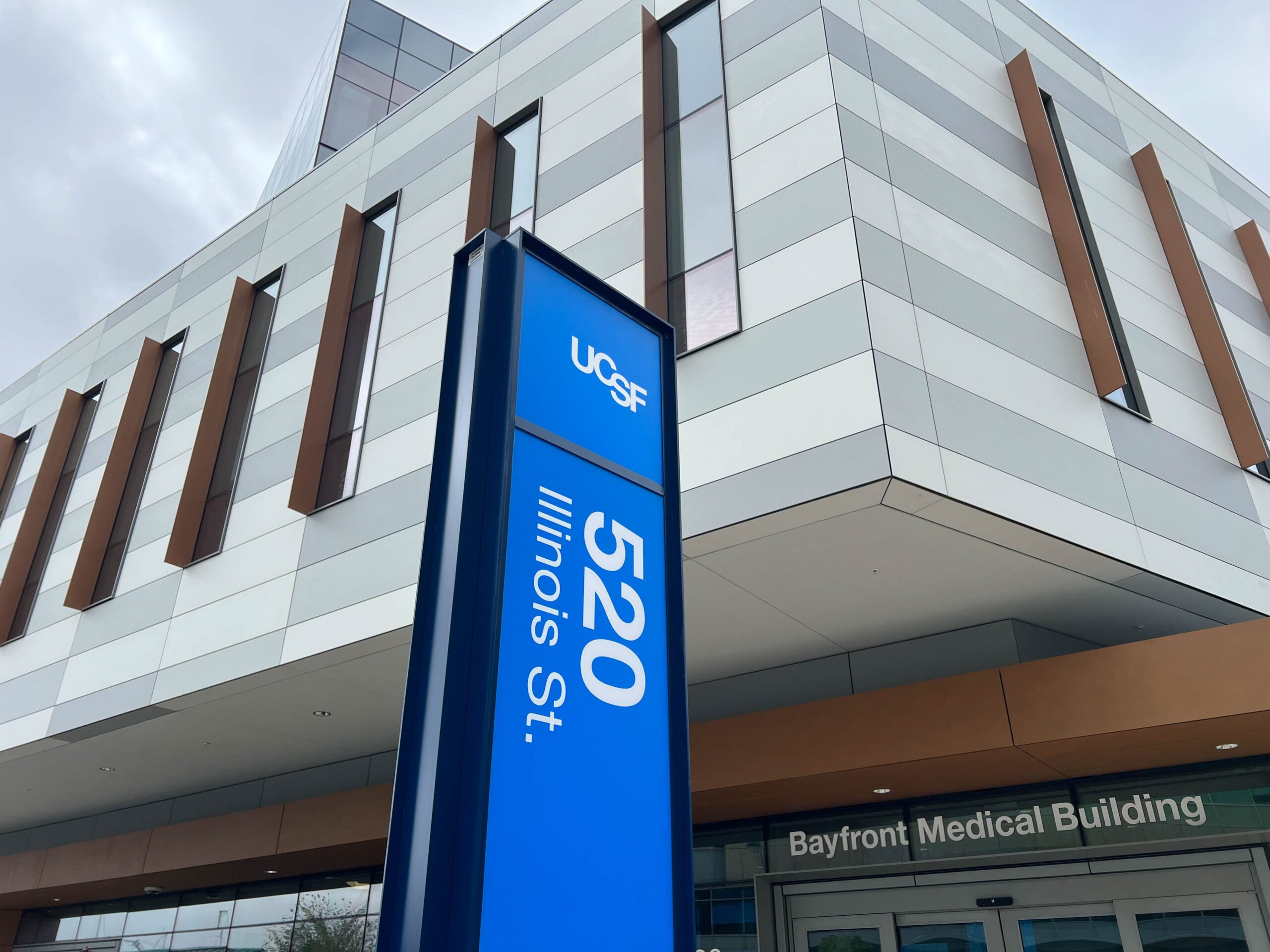Blue UCSF address monument outside the Bayfront Medical Building