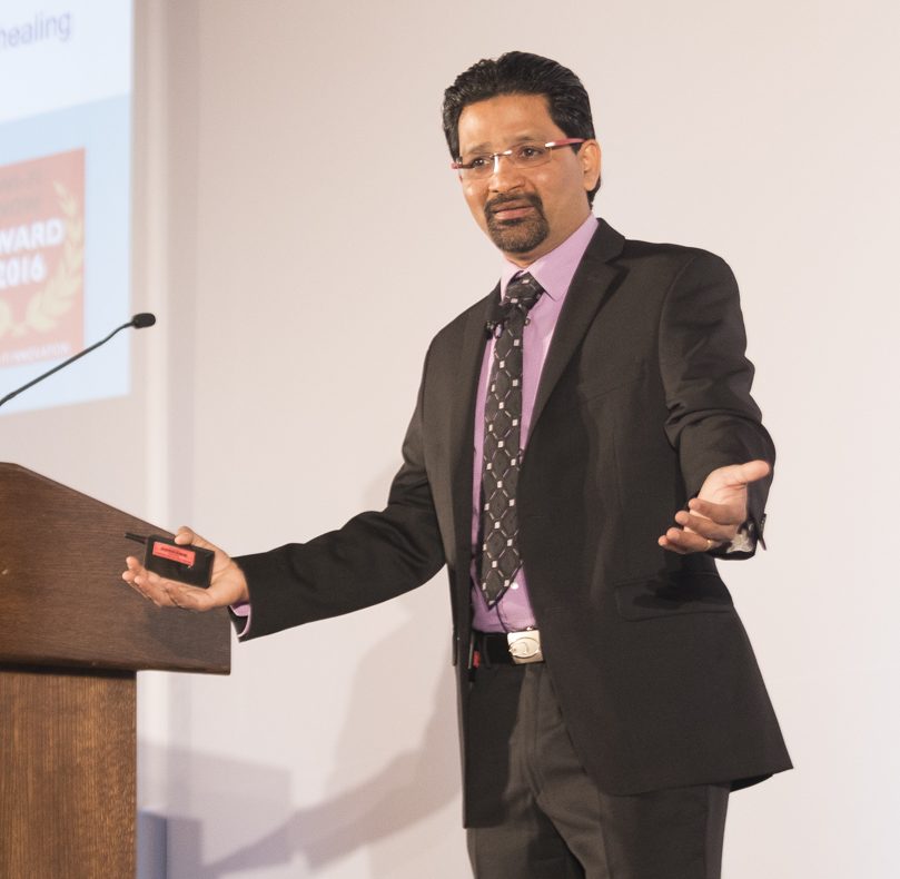 Gopi Sirineni speaking at a Wi-Fi industry conference