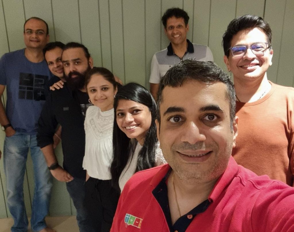 GOQii management team posing together in a photograph published in February 2022