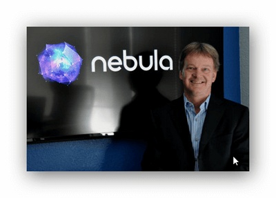 Gordon Stitt standing beside the Nebula sign in a photograph accompanying his 2013 CEO appointment