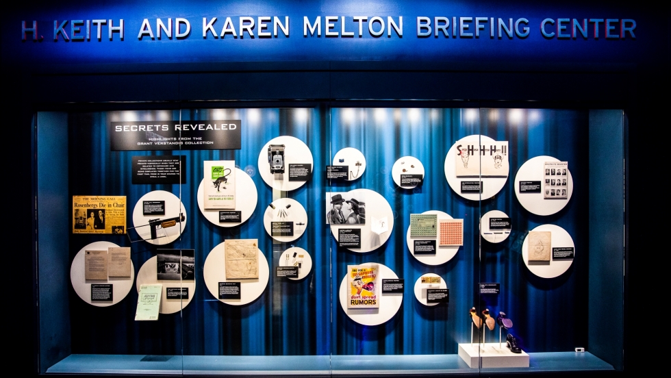 The Secrets Revealed exhibit case filled with documents, cameras and concealed tools from Verstandig’s collection