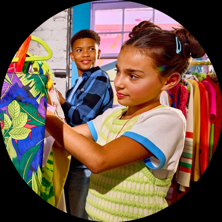 Greenlight marketing image showing a young shopper and a real-time purchase notification