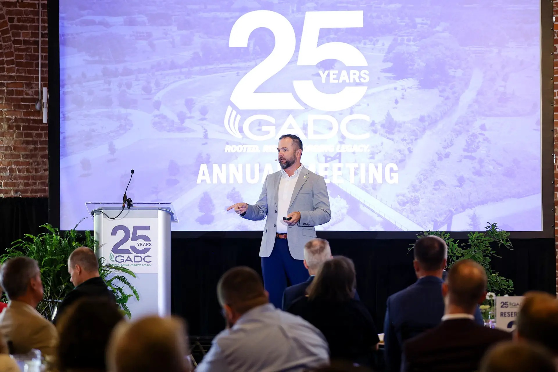 GADC CEO Max Stewart presents at the organization's 25th anniversary annual meeting