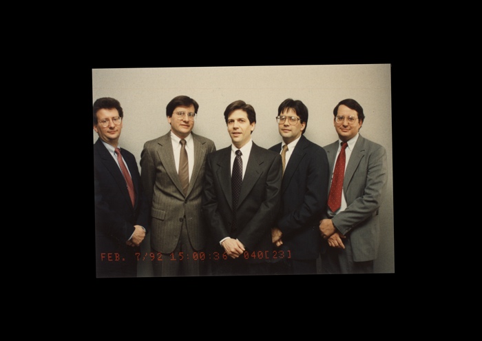 Archival photograph of the five Bentley brothers in business suits