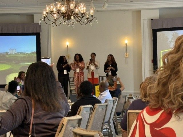 Attendees gathered for a presentation at the Savannah event