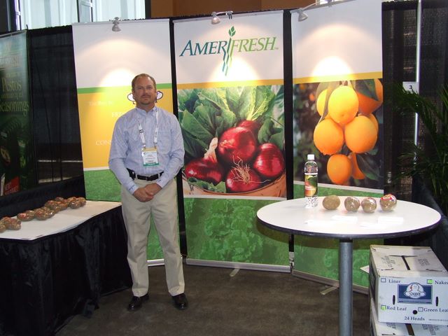 Greg Reinauer standing at the Amerifresh booth at CPMA 2008 in Calgary