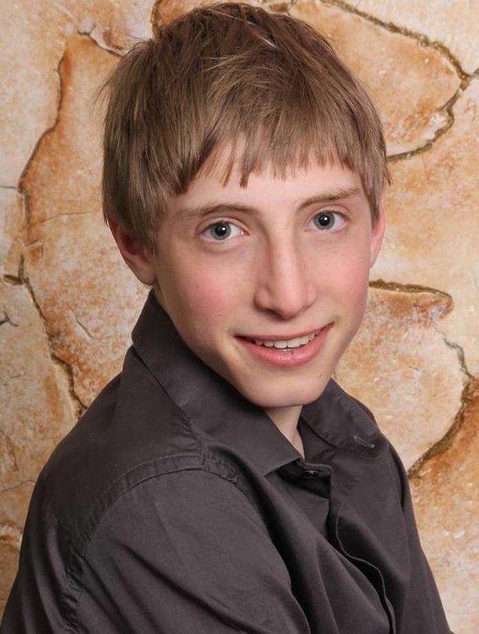 An archival photograph of Greg Volynsky from his school-era personal website
