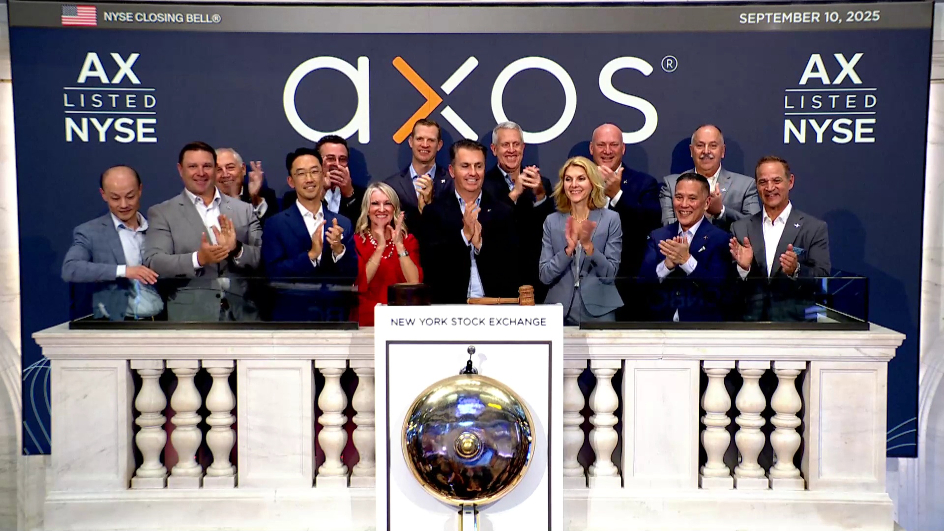 Gregory Garrabrants with Axos colleagues at the New York Stock Exchange closing-bell podium