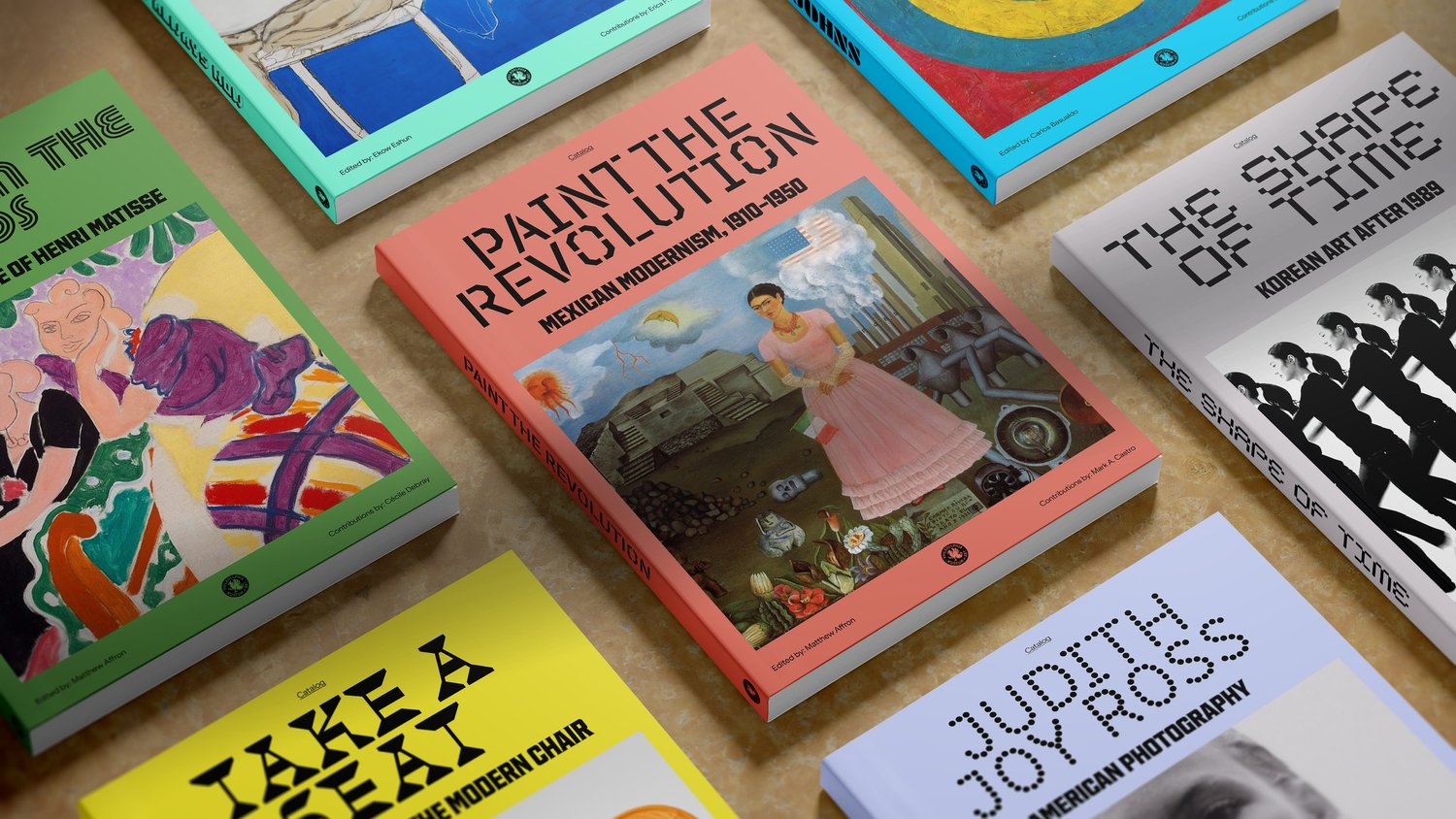 Colorful Philadelphia museum art books laid out together