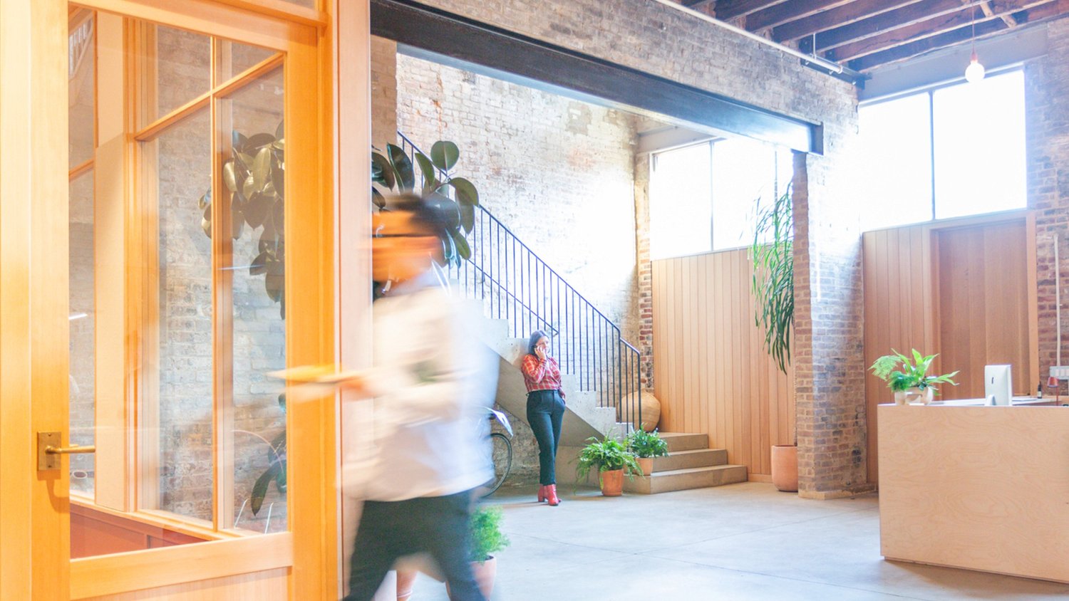 Interior of Gretel's Brooklyn design studio with people at work