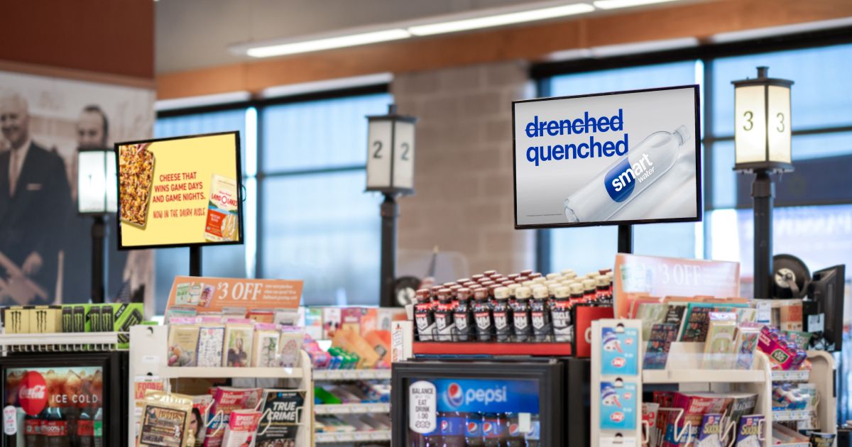 Grocery TV digital screens running brand ads at a grocery store checkout