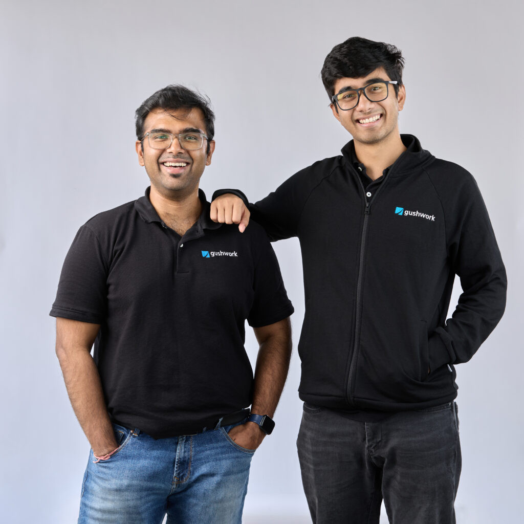 Gushwork co-founders Adithya Venkatesh and Nayrhit Bhattacharya wearing company shirts